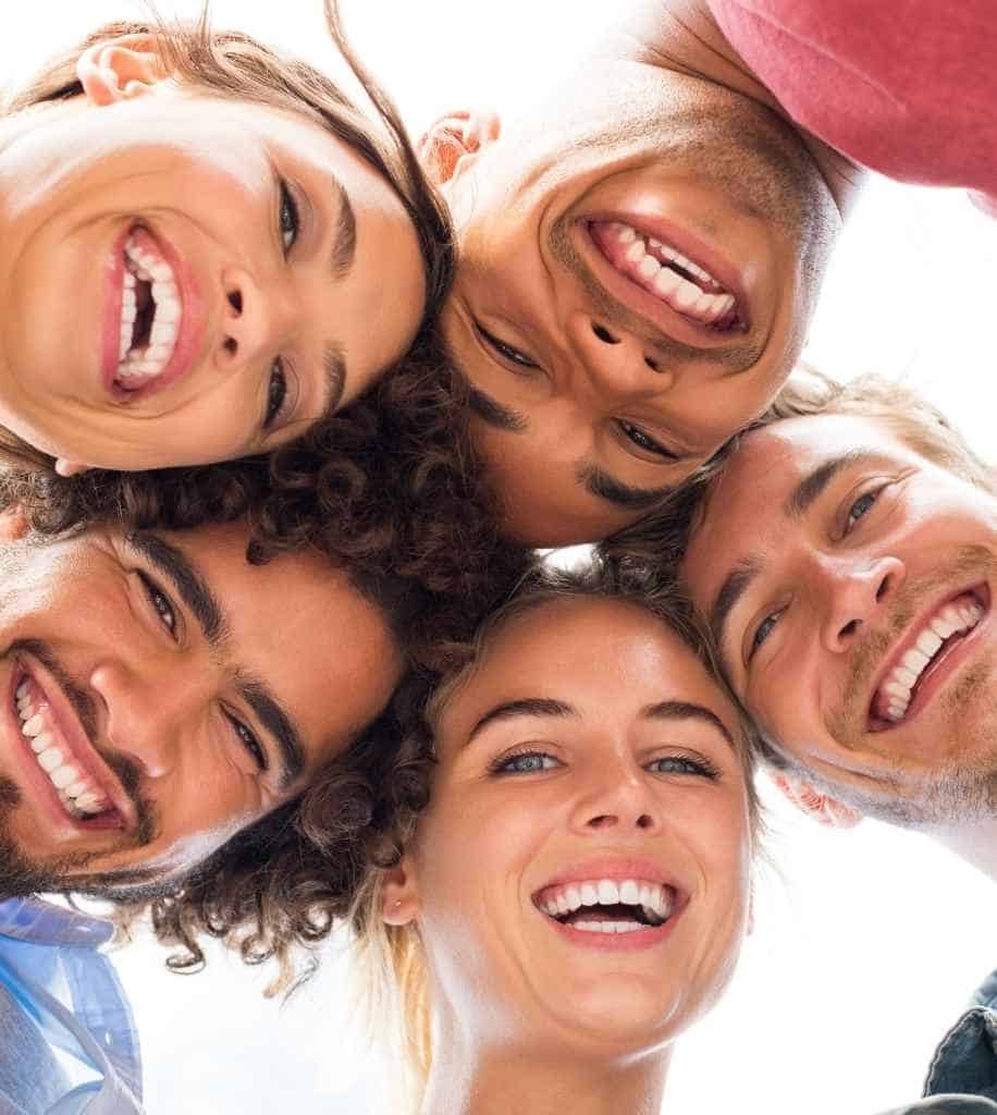 Smiling person showcasing white teeth after laser whitening treatment Doncaster